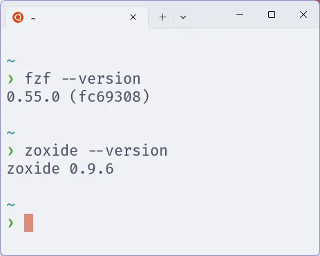 Terminal com o Zsh, em que se verifica as versões do FZF e do Zoxide.