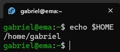 Terminal do Fedora, em que se executa o comando "echo $HOME". A resposta é "/home/gabriel".
