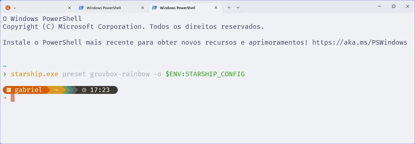 Terminal com o PowerShell, em que se executa o comando para definir o tema Gruvbox Rainbow no Starship. Imediatamente, o prompt é atualizado com o novo tema.